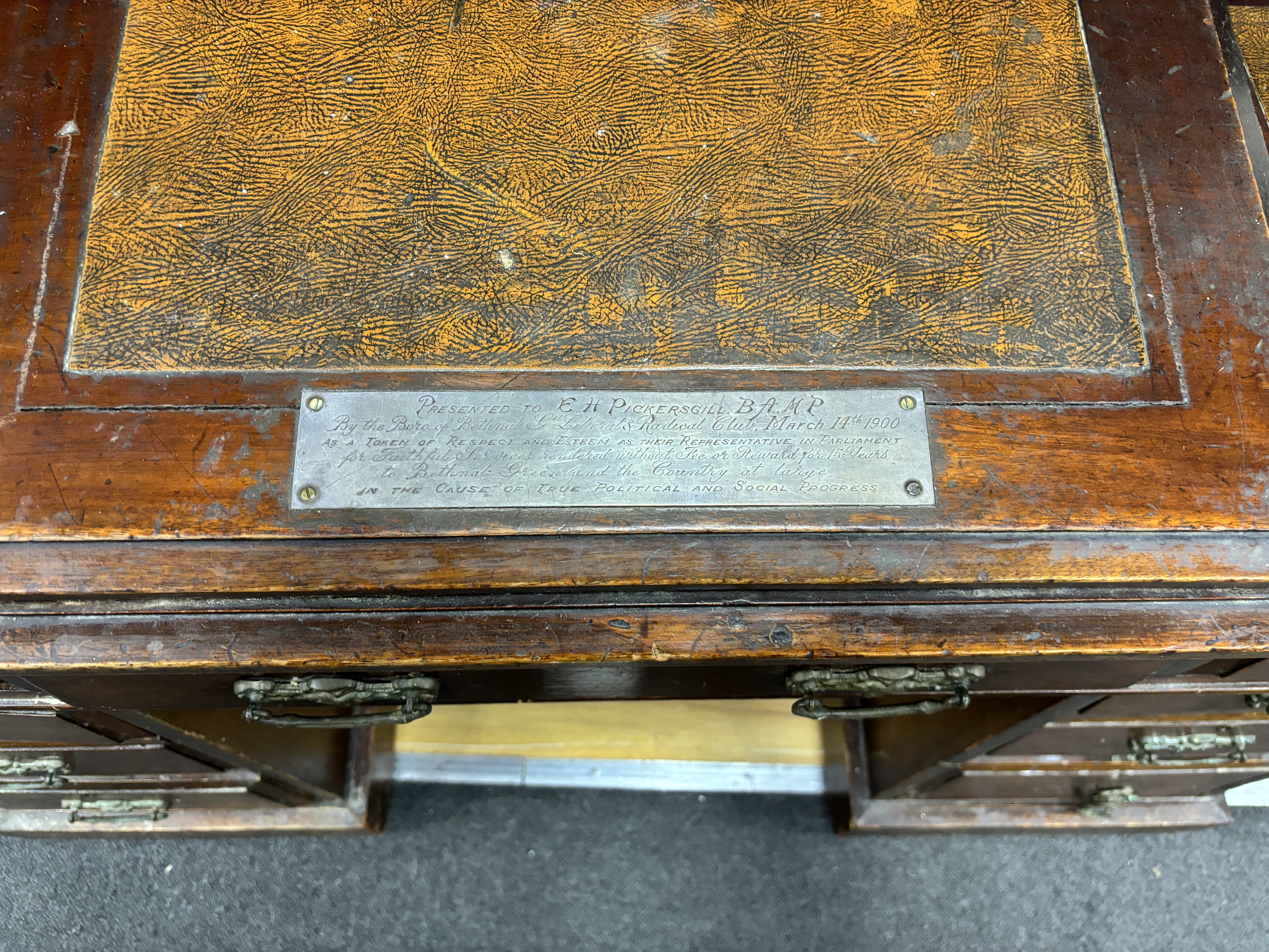 A late Victorian mahogany pedestal desk, width 118cm, depth 65cm, height 148cm, Provenance: Pickersgill, Labour MP and an associated late Victorian mahogany office elbow chair, provenance as above